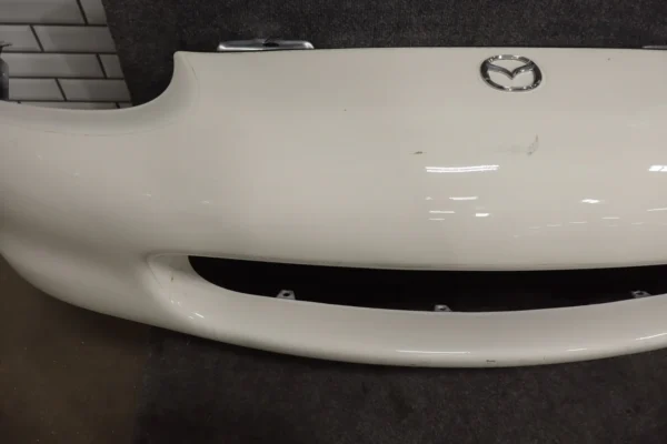 57_121c2d9a-251a-4710-afd2-18877cec5a5d 1999-2000 Mazda MX-5 Miata Front Bumper White PT