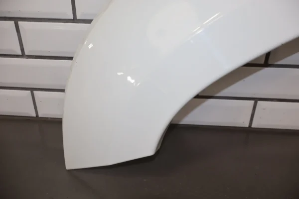 57_2bf6e333-fb36-49fb-a8ef-b4497729349d 2009 Chevrolet Suburban 1500 Z71 Left Fender Molding OEM