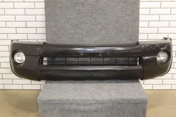 57_4a3f48b5-9376-4cae-a64b-593b89e8056e 05-11 Toyota Tacoma Base Model Front Bumper Cover W/Fog Lights & Rebar *Damage*