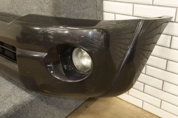 57_51a6f6e6-8022-4bd7-ac71-a4f1a790d2e0 05-11 Toyota Tacoma Base Model Front Bumper Cover W/Fog Lights & Rebar *Damage*