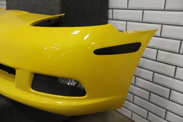 57_6b8b8ec7-e3f5-4363-be10-f6d10f2037df 2006-2009 Chevrolet Corvette Base Front Bumper Yellow 19120412