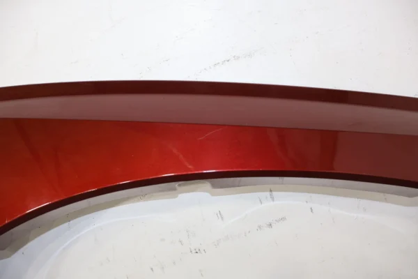 57_6e804575-fd4a-46d3-8264-df64e760276e 02-06 Cadillac Escalade Front Right RH OEM Fender Flare Moulding (Redfire 72U)