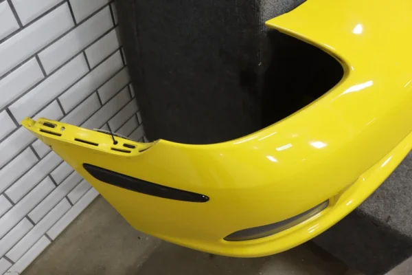 57_702f7cd2-3da1-428a-b1bd-fc93c4a5e573 2006-2009 Chevrolet Corvette Base Front Bumper Yellow 19120412