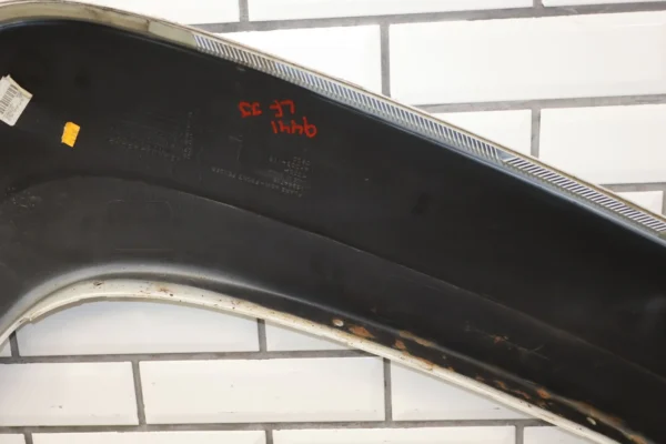 57_7efd9e77-4fec-484e-9afc-fec356b949a6 2009 Chevrolet Suburban 1500 Z71 Left Fender Molding OEM