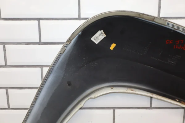 57_83d0b138-9edd-4b77-ab3b-c8ab35a07cf1 2009 Chevrolet Suburban 1500 Z71 Left Fender Molding OEM