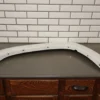 57_8fc00ca7-cbb7-4672-844e-d644c83fd3a6 2009 Chevrolet Suburban 1500 Z71 Left Fender Molding OEM
