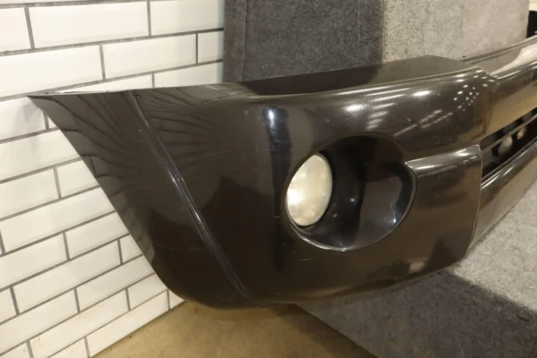 57_944a7c61-f6fe-4a31-8e93-205419407c85 05-11 Toyota Tacoma Base Model Front Bumper Cover W/Fog Lights & Rebar *Damage*