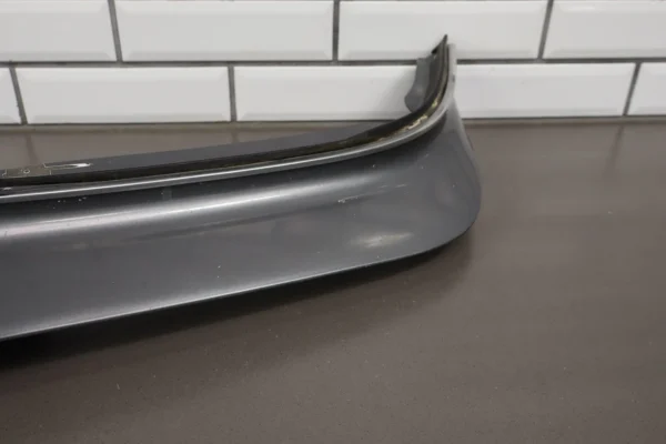 57_9a5bbdd7-a0cb-4a7f-85cf-1264c196c1c7 1993 Cadillac Fleetwood Front Bumper Filler Panel