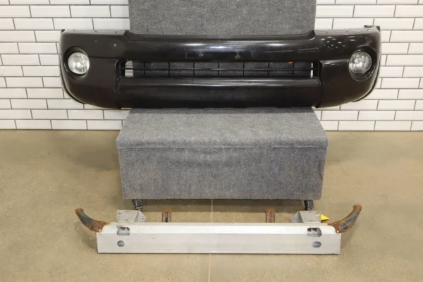 57_aeb0ba0b-de46-4500-97f4-0f06792b118d 05-11 Toyota Tacoma Base Model Front Bumper Cover W/Fog Lights & Rebar *Damage*