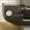 57_c7779faa-3d24-4742-8f00-64cf8e63fb16 05-11 Toyota Tacoma Base Model Front Bumper Cover W/Fog Lights & Rebar *Damage*