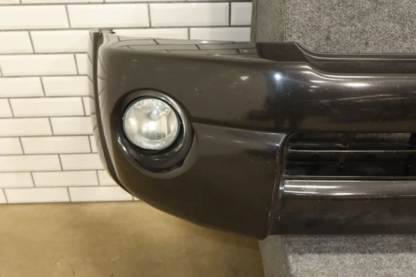 57_c7779faa-3d24-4742-8f00-64cf8e63fb16 05-11 Toyota Tacoma Base Model Front Bumper Cover W/Fog Lights & Rebar *Damage*