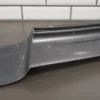 57_cf496531-a3cb-4870-bb5e-c8dd4a1e23c3 1993 Cadillac Fleetwood Front Bumper Filler Panel