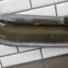 57_d50cc999-ea96-43fb-85b2-4b24696f949b 1993 Cadillac Fleetwood Front Bumper Filler Panel