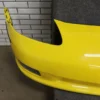 57_d7c9cc68-6543-45fa-bedb-914f83b41ee6 2006-2009 Chevrolet Corvette Base Front Bumper Yellow 19120412