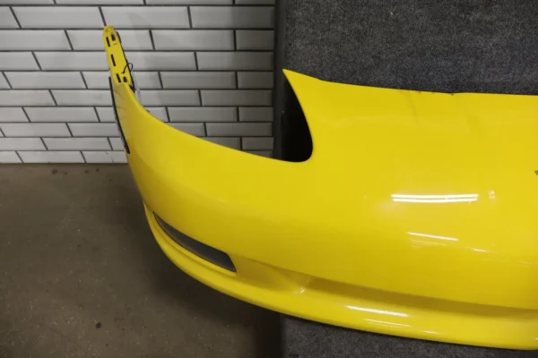 57_d7c9cc68-6543-45fa-bedb-914f83b41ee6 2006-2009 Chevrolet Corvette Base Front Bumper Yellow 19120412