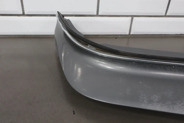 57_e1c46caf-58b1-48e0-9ea1-bdc96c6c7828 1993 Cadillac Fleetwood Front Bumper Filler Panel