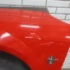 57_e8010bae-1563-49f5-9ce5-9ea105f26c9f 1999-2004 Ford Mustang GT Left Fender XR3Z16006AA Performance Red ES XR3Z16006AA