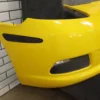 57_f6f468c0-a07b-4b99-a062-3758ddb8abd7 2006-2009 Chevrolet Corvette Base Front Bumper Yellow 19120412