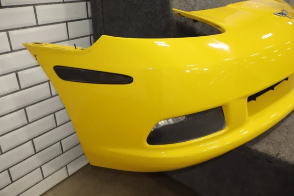 57_f6f468c0-a07b-4b99-a062-3758ddb8abd7 2006-2009 Chevrolet Corvette Base Front Bumper Yellow 19120412