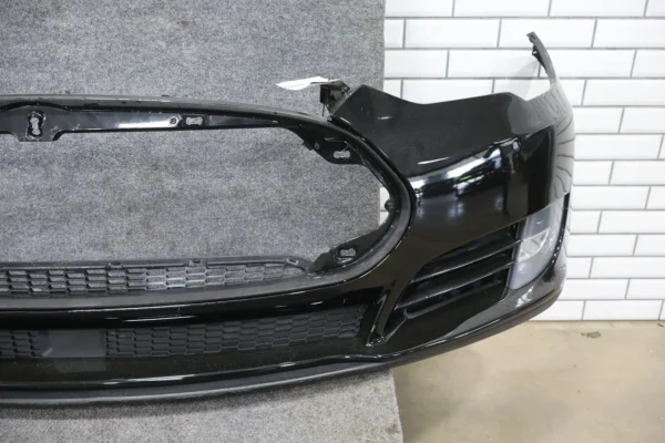 web_3e1accd1-8931-488c-b149-9395a39c1e5e 2012-2015 Tesla Model S Front Bumper Assembly Black PBSB